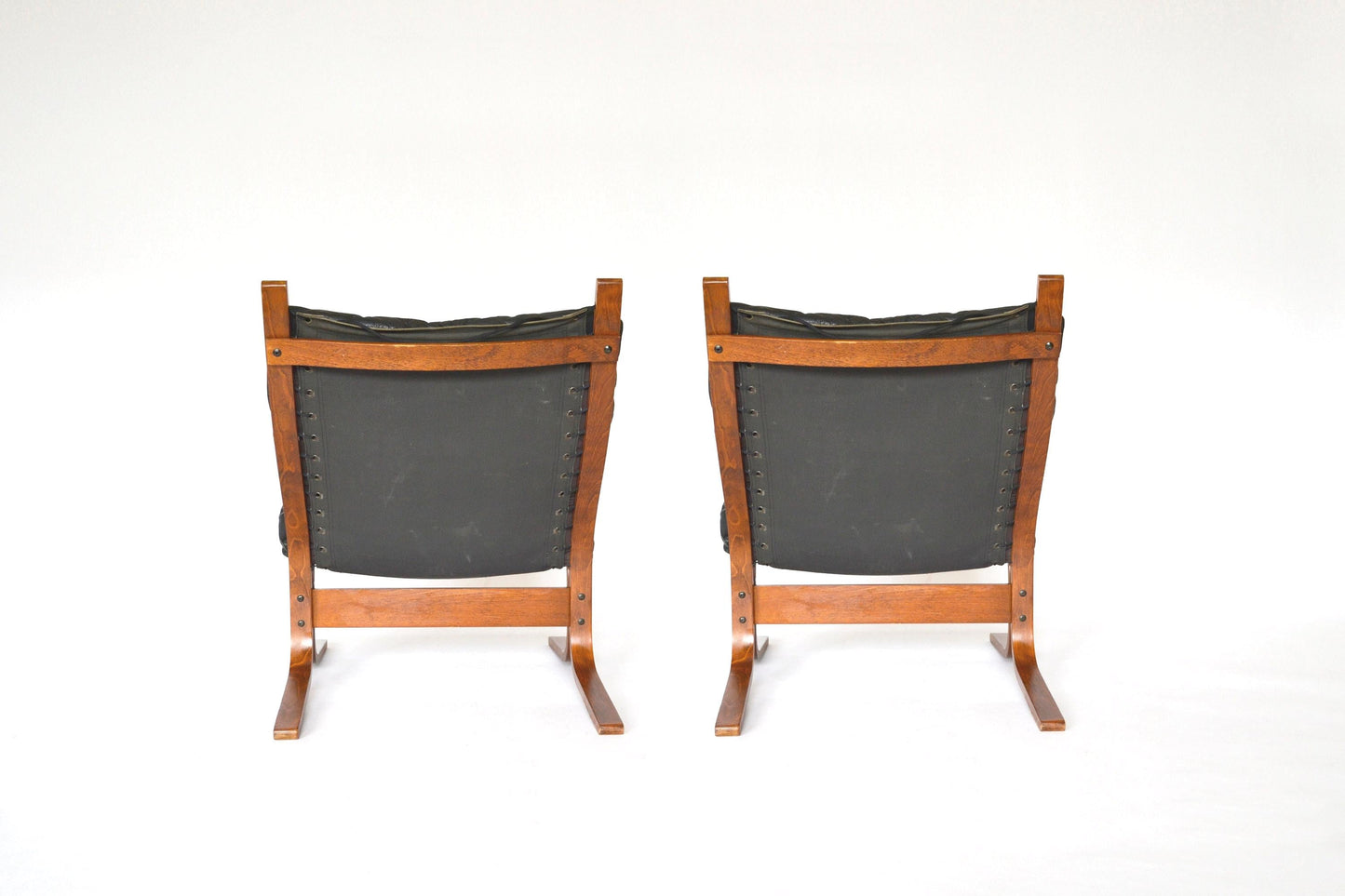 Vintage Black Leather Brown Plywood Siesta Chair Ingmar Relling Westnofa Denmark 1970s set of 2 Scandinavian Mid Century Modern Furniture