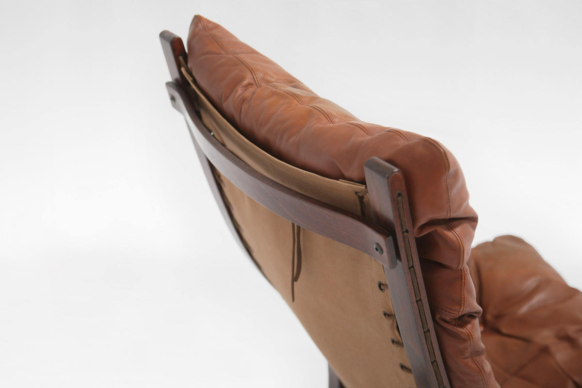 High-Back Siesta Lounge Chair in Cognac Leather & Plywood by Ingmar Relling for Westnofa, 1960s