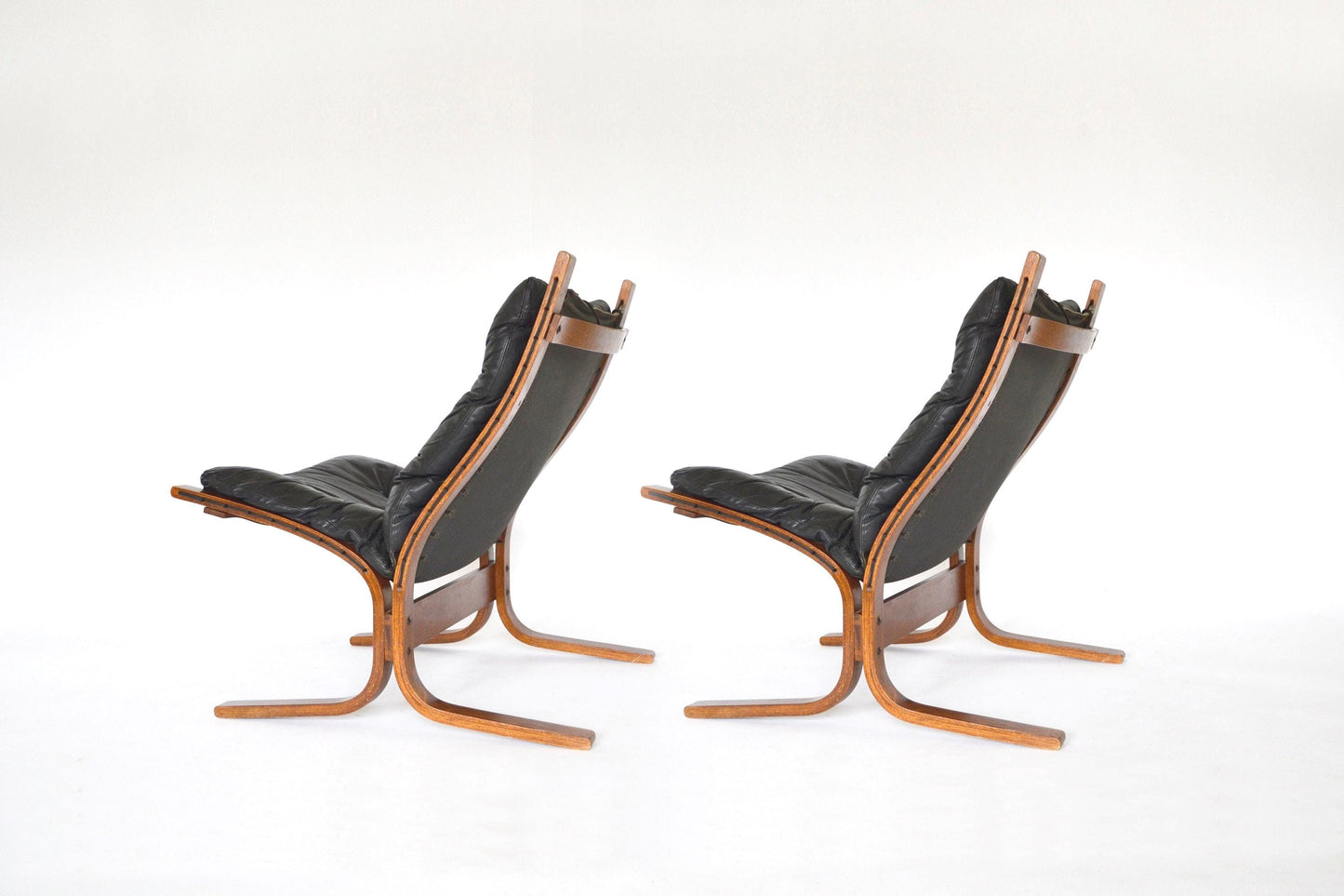 Vintage Black Leather Brown Plywood Siesta Chair Ingmar Relling Westnofa Denmark 1970s set of 2 Scandinavian Mid Century Modern Furniture