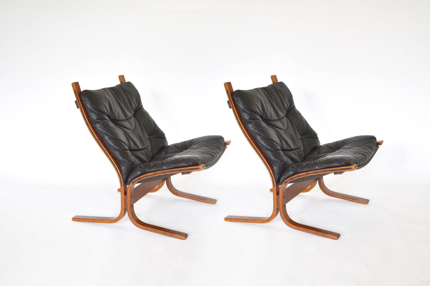 Vintage Black Leather Brown Plywood Siesta Chair Ingmar Relling Westnofa Denmark 1970s set of 2 Scandinavian Mid Century Modern Furniture