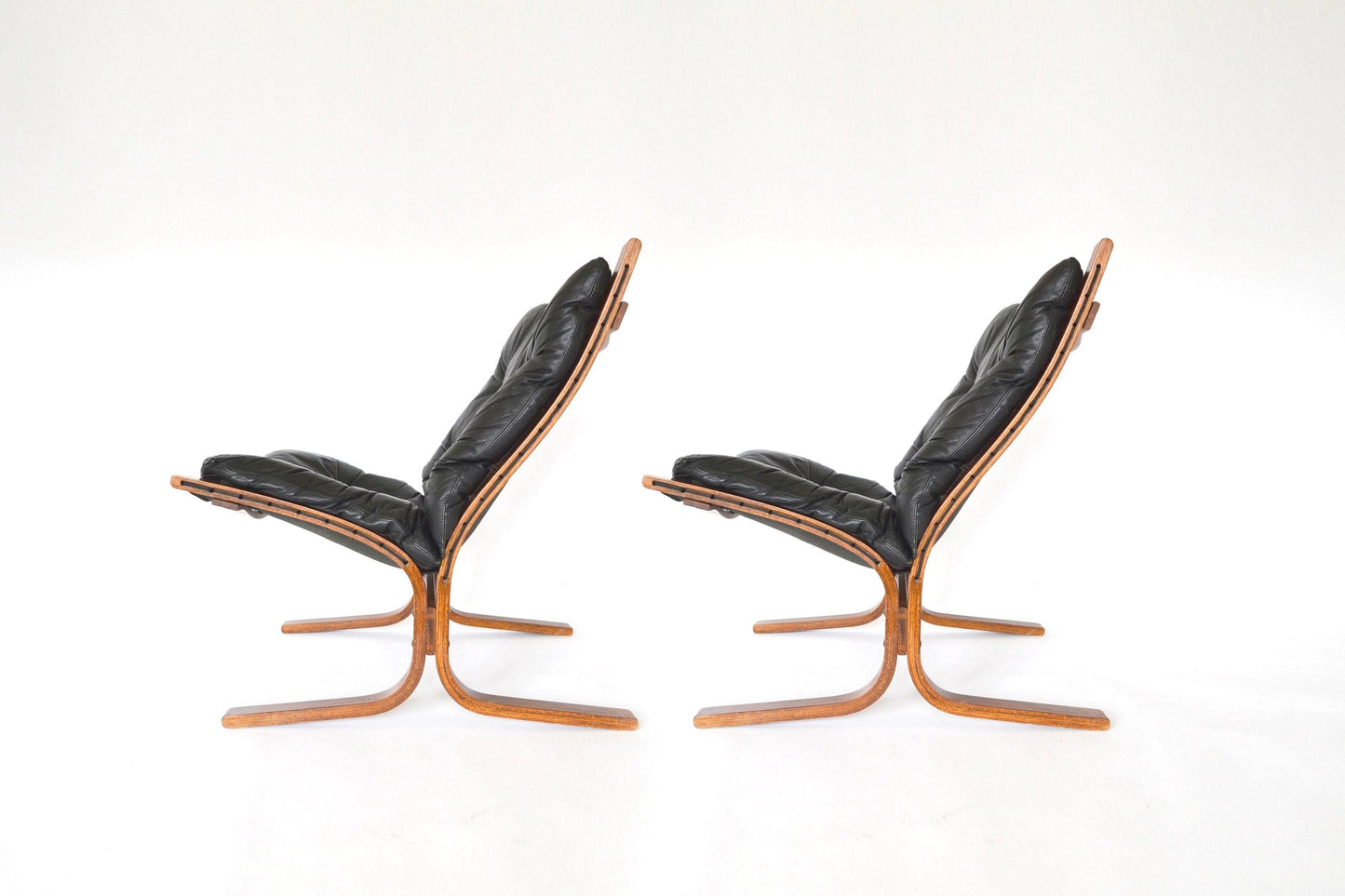 Vintage Black Leather Brown Plywood Siesta Chair Ingmar Relling Westnofa Denmark 1970s set of 2 Scandinavian Mid Century Modern Furniture
